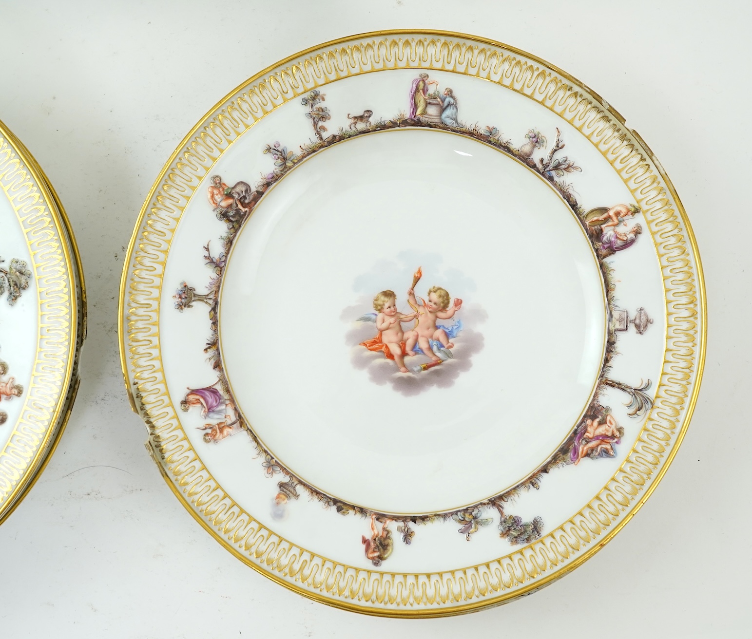 A set of six Meissen plates, decorated in the Capodimonte style, late 19th century